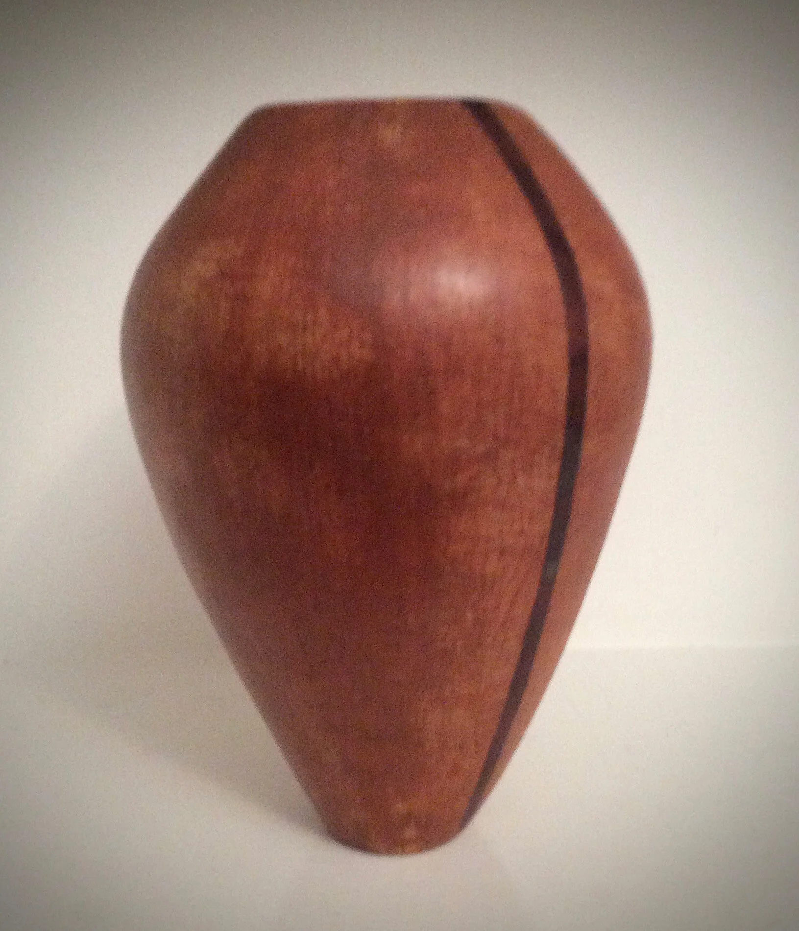Vessel with dark red stripe. Redart terra sigillata with glaze stripe.