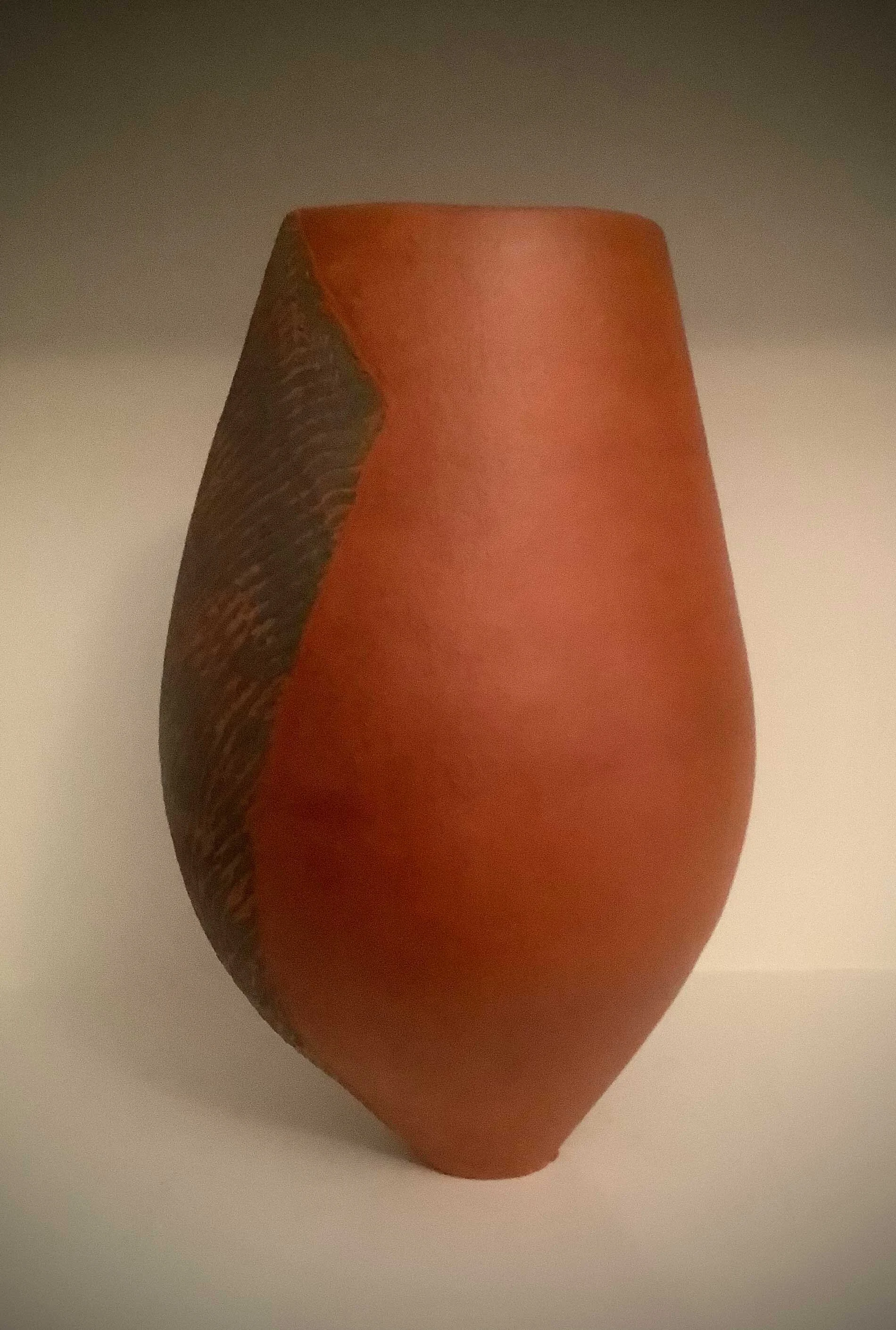 Tall terra cotta. Terra cotta. Black slip design over Redart terra sigillata surface.