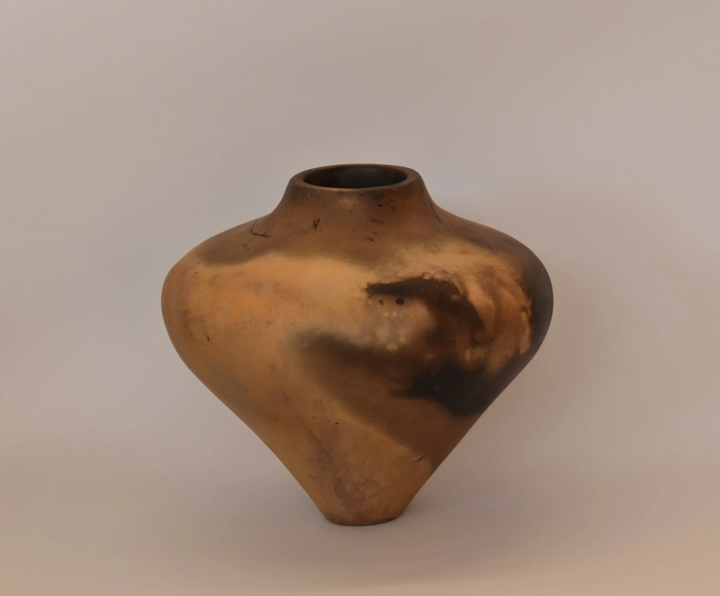 Shades of yellow smoke fired vessel