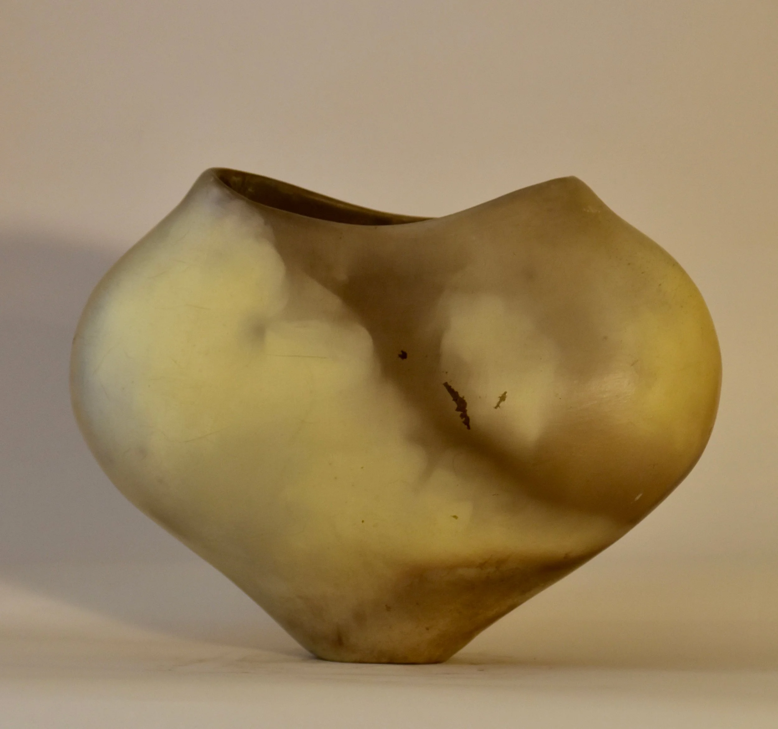Smoke fired yellow vessel