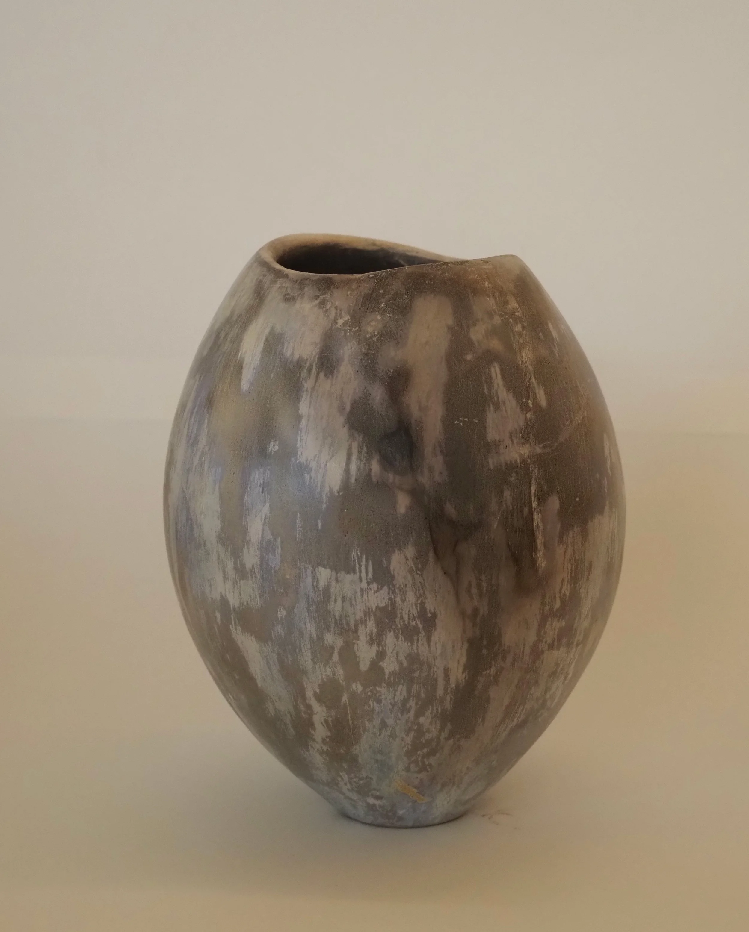 Shades of silvery blue smoke fired vessel