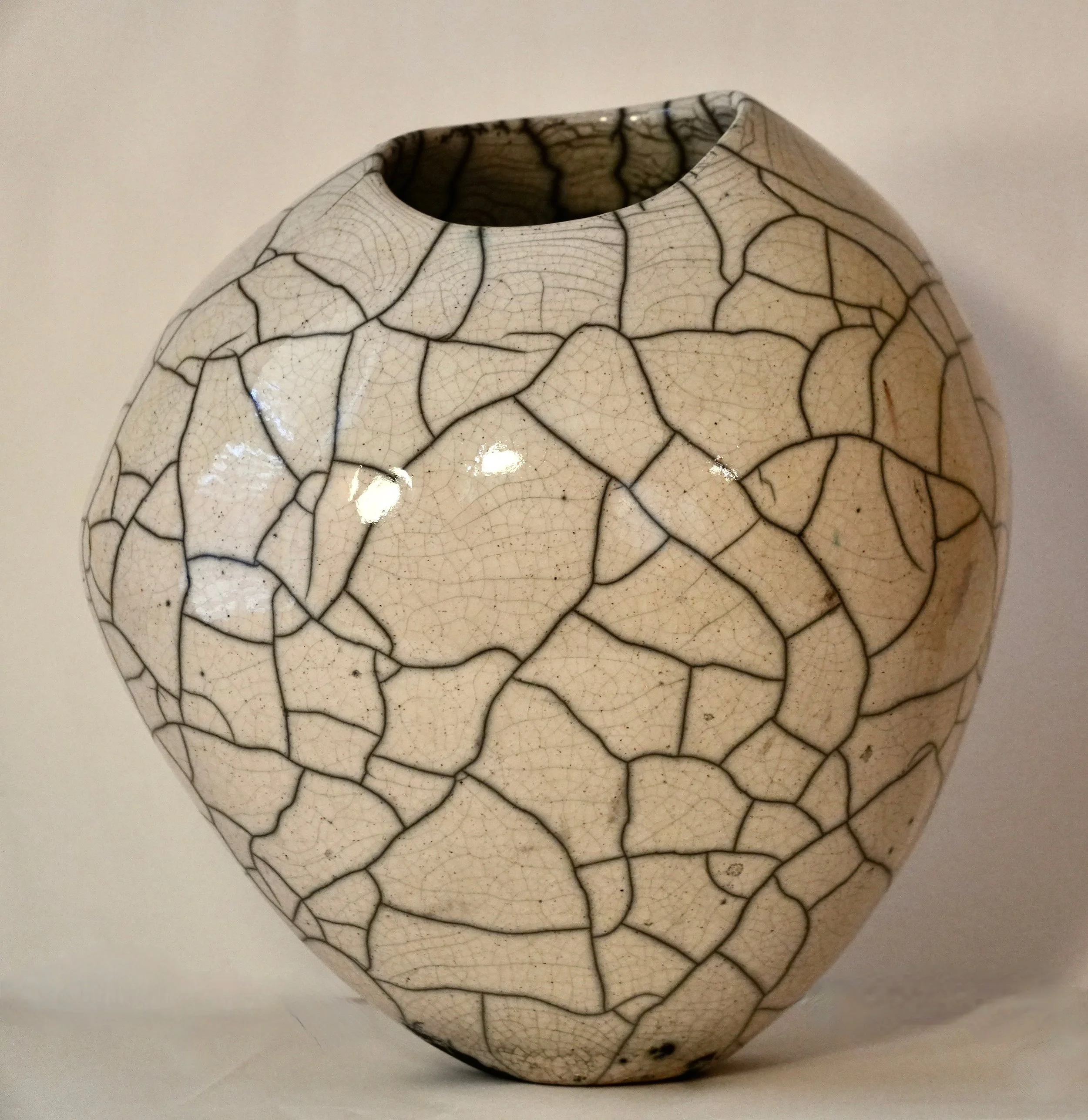 Asymmetrical raku vessel