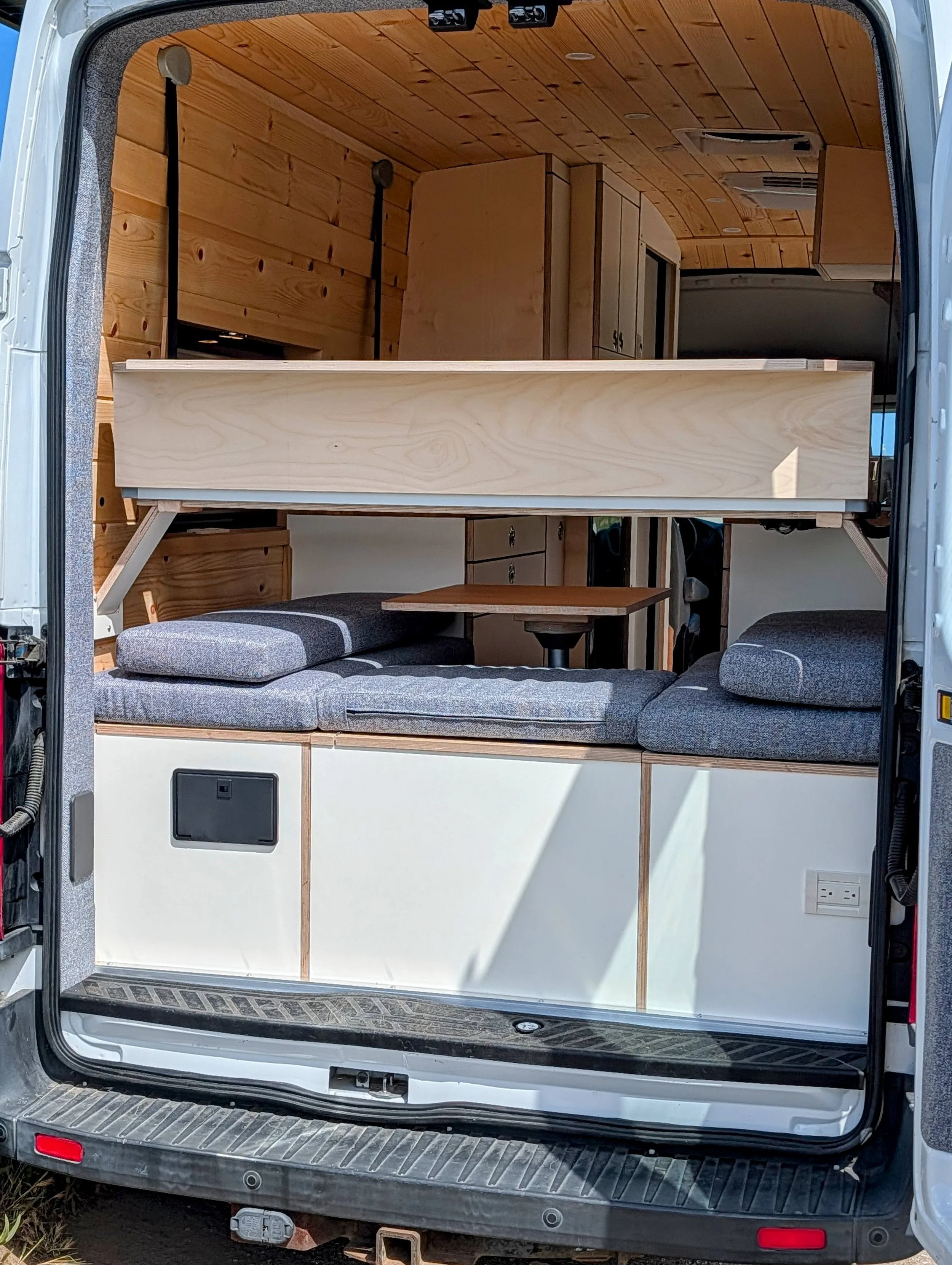 Custom Ford Transit Conversion, bed lift, custom cabinetry, Euroloft