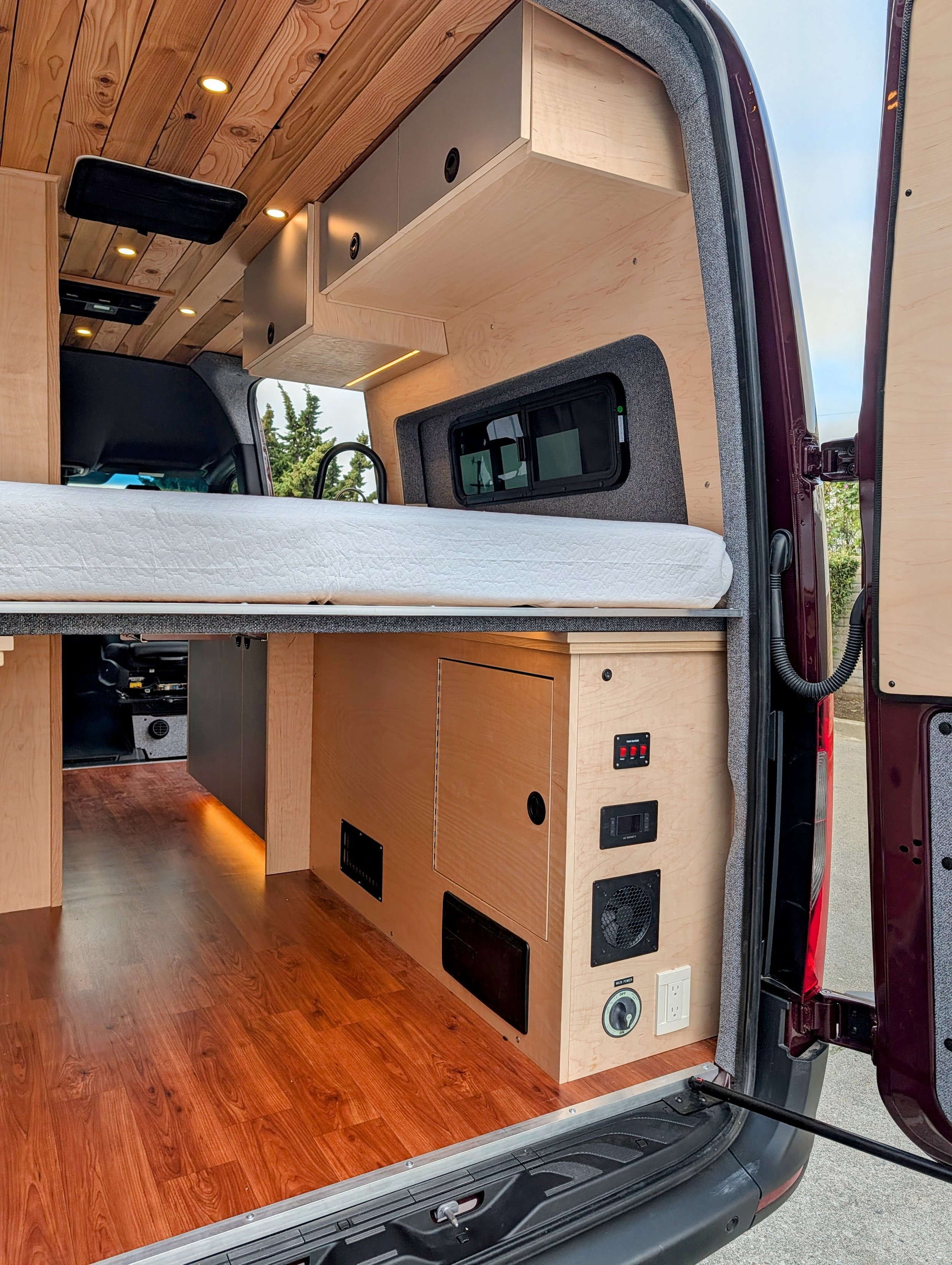 Custom Mercedes Sprinter Camper Van, bed, cabinetry