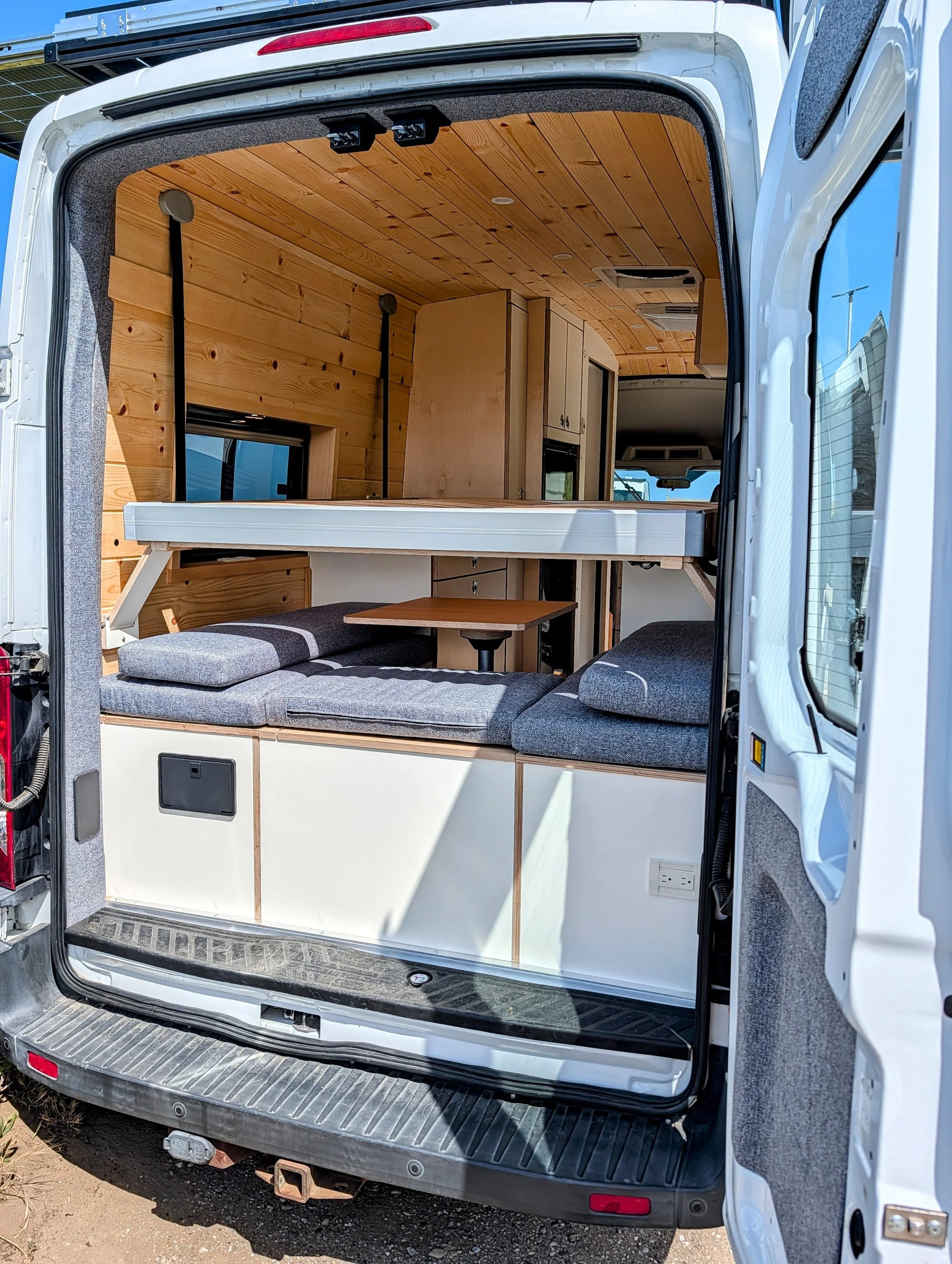 Custom Ford Transit Conversion, bed lift, custom cabinetry, Euroloft