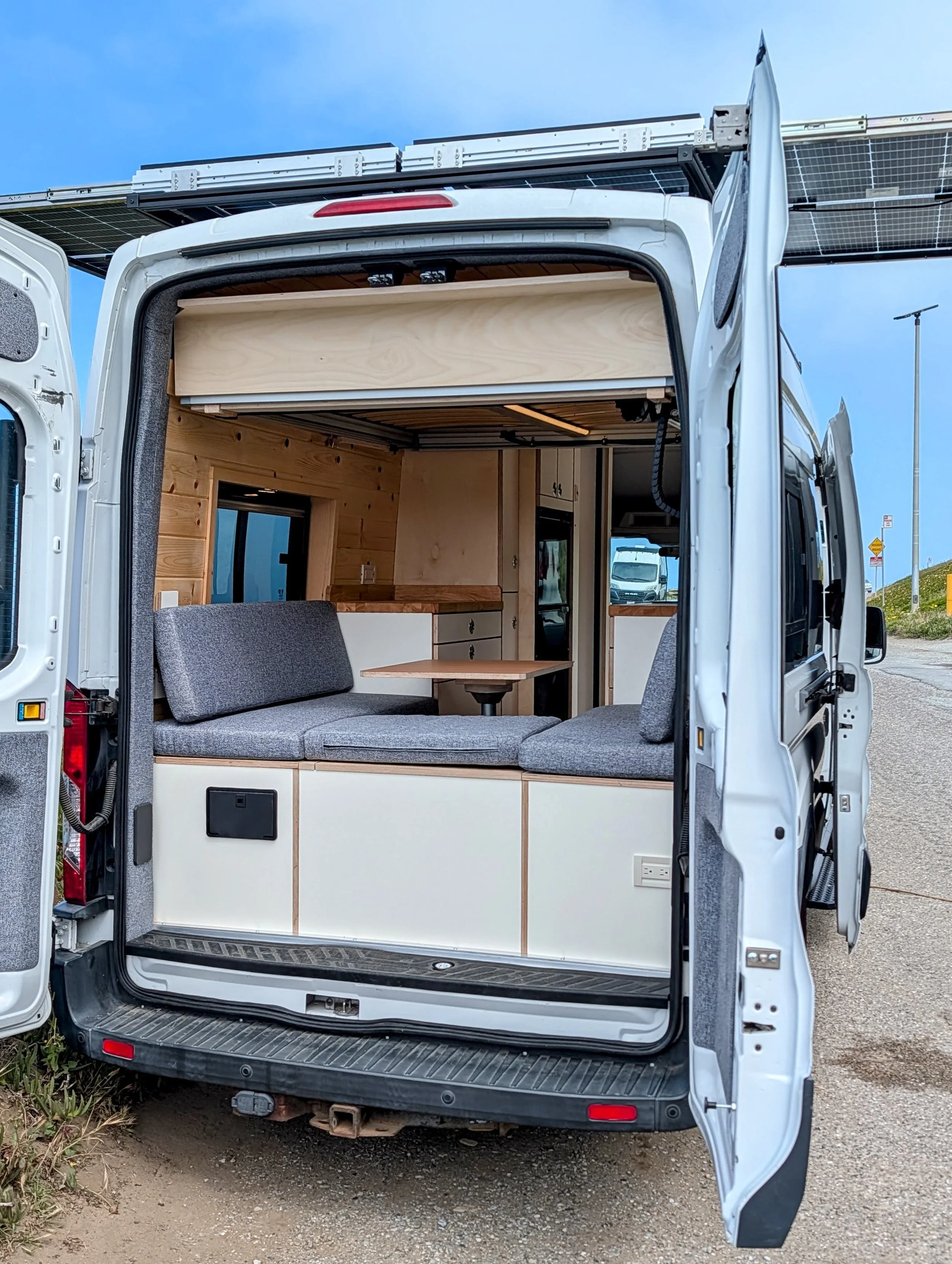 Custom Ford Transit Conversion, bed lift, custom cabinetry, Euroloft