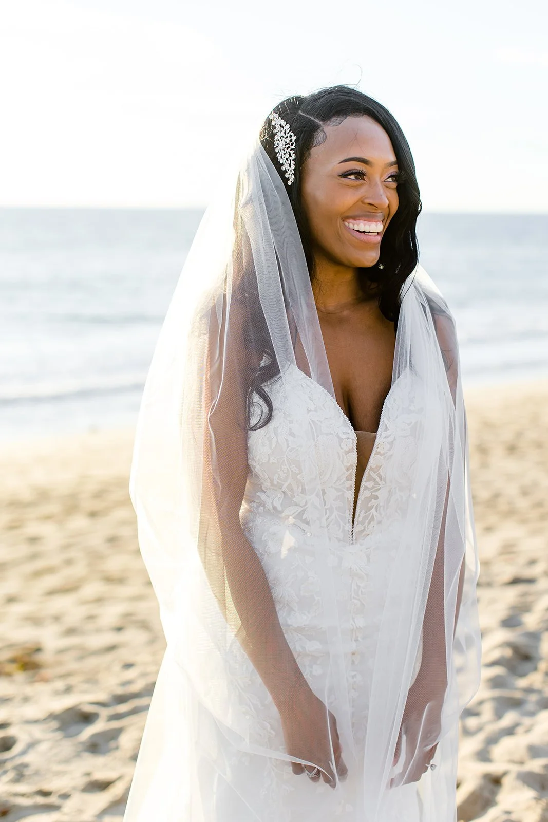 Bride in wedding dress at Point Dume, Malibu