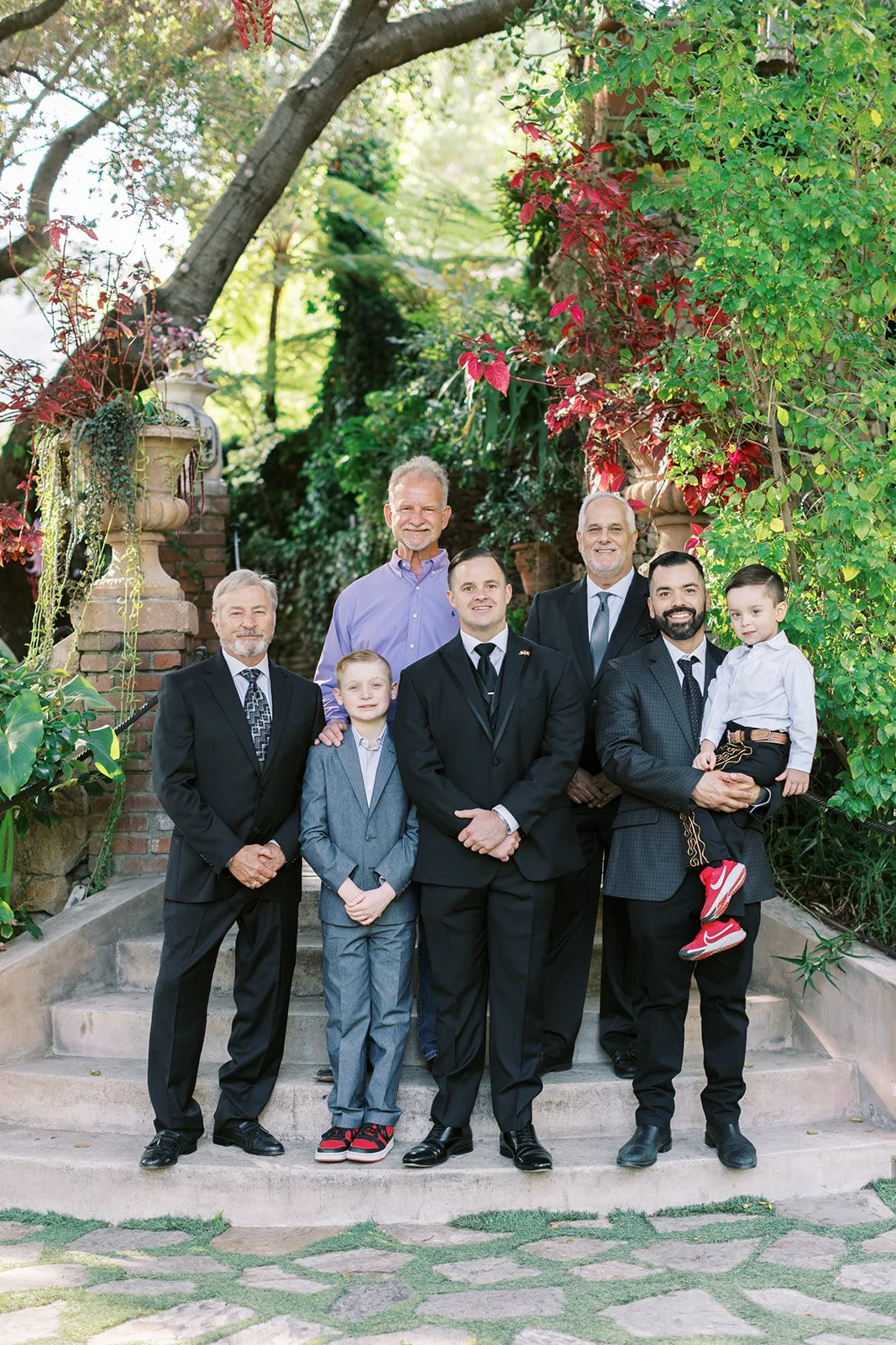 Portrait of the groom with the men in his family at his small wedding in Los Angeles