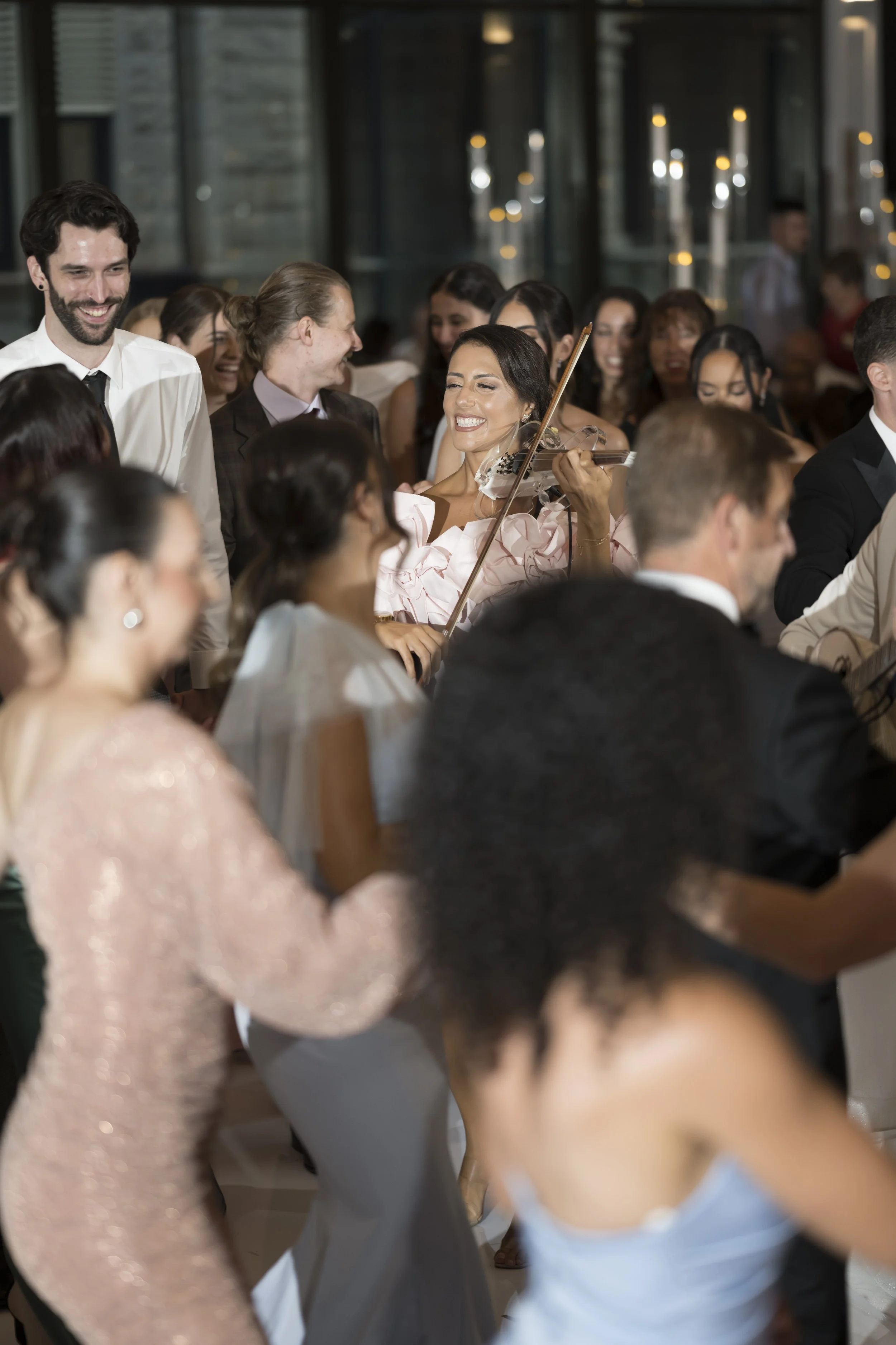 Violinist performing to Greek music for greek dancing segment at Sydney wedding reception