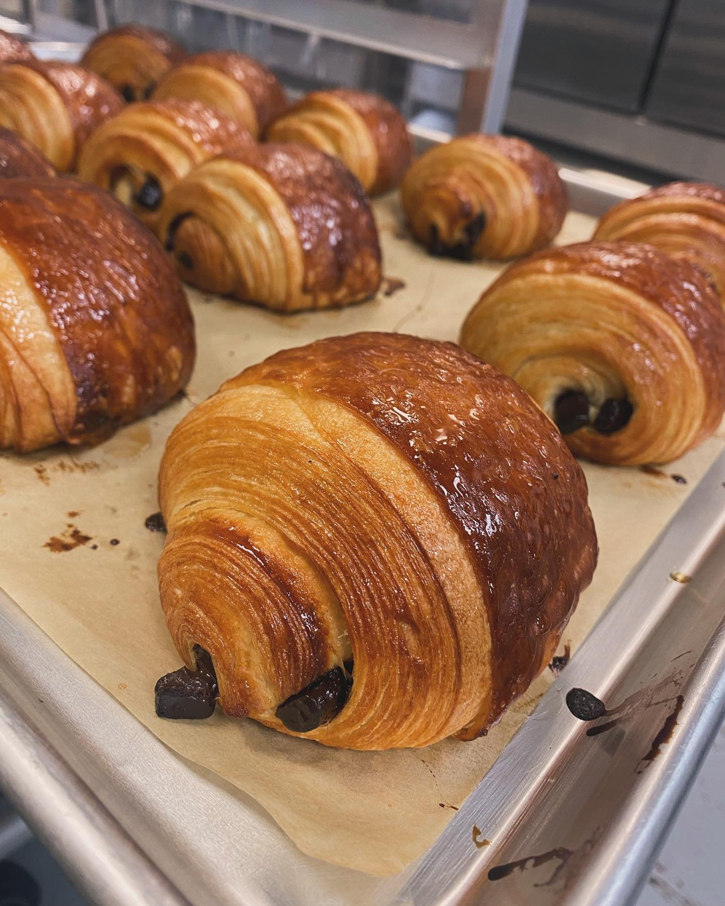 FUN FACT: Pain au Chocolat is our #1 selling bakery item. 

Layers of buttery croissant, with a crunchy outside and soft inside filled with two @valrhonausa chocolate batons. We agree with your top pick!

Can you guess our #1 selling coffee? Tell us 