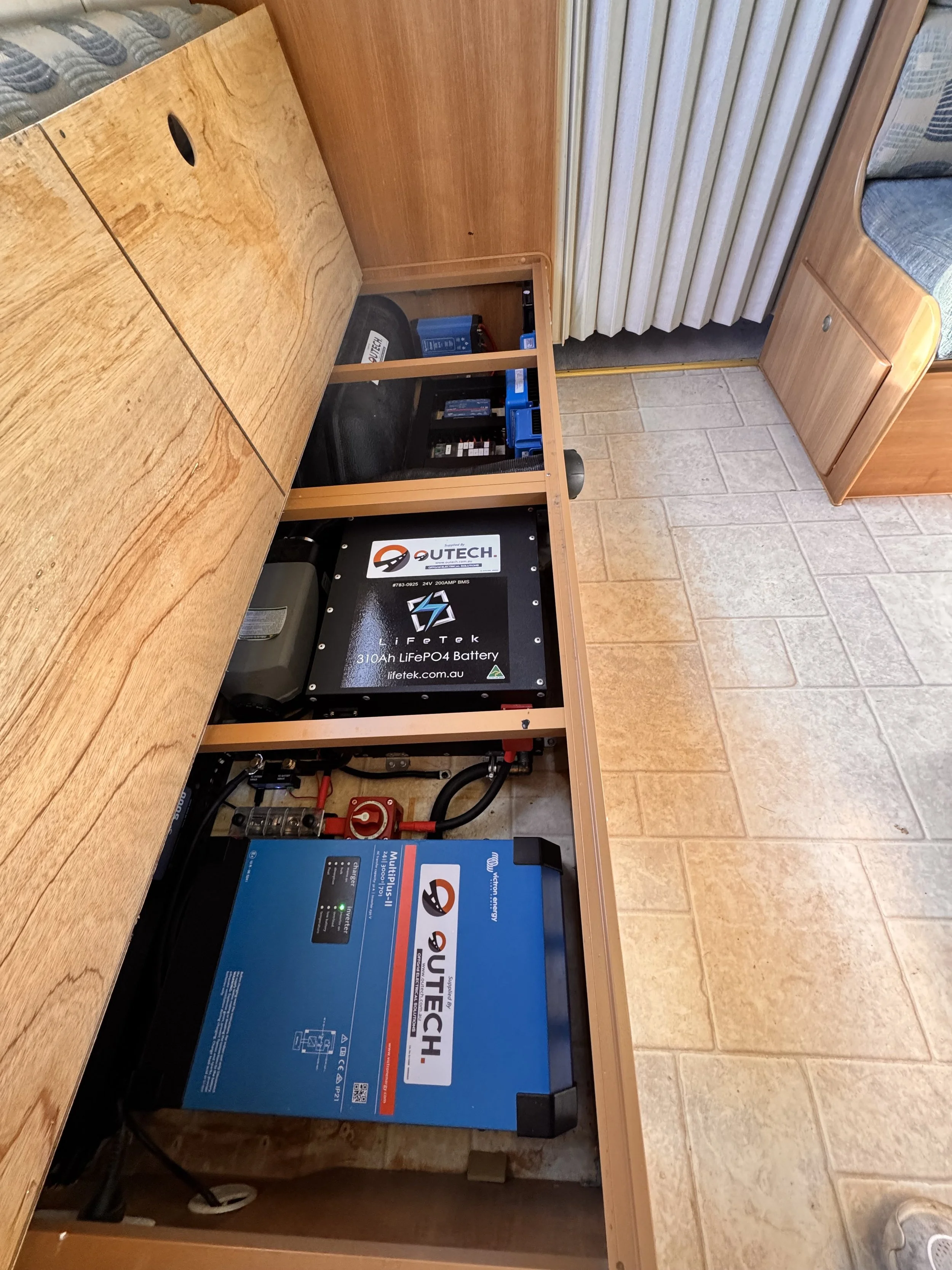 Caravan Power Setup with Lithium Battery, Inverter, DCDC Charger, AC Charger and Solar Chargers.  Caravan Power system for camping off grid.