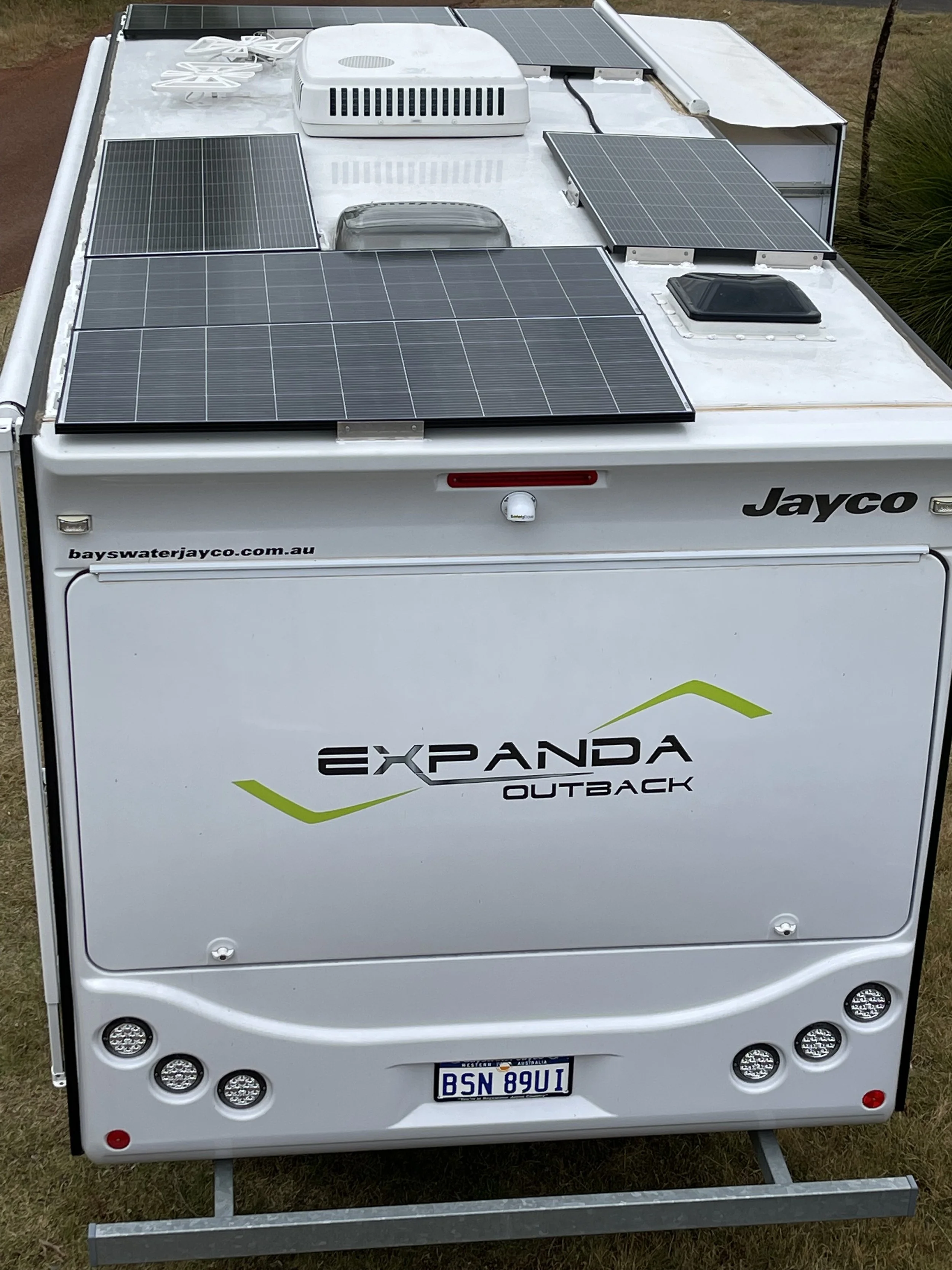 Jayco Expanda Outback lithium battery and solar panel power system for off-grid camping.