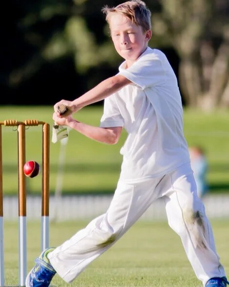 NZ boy playing cricket