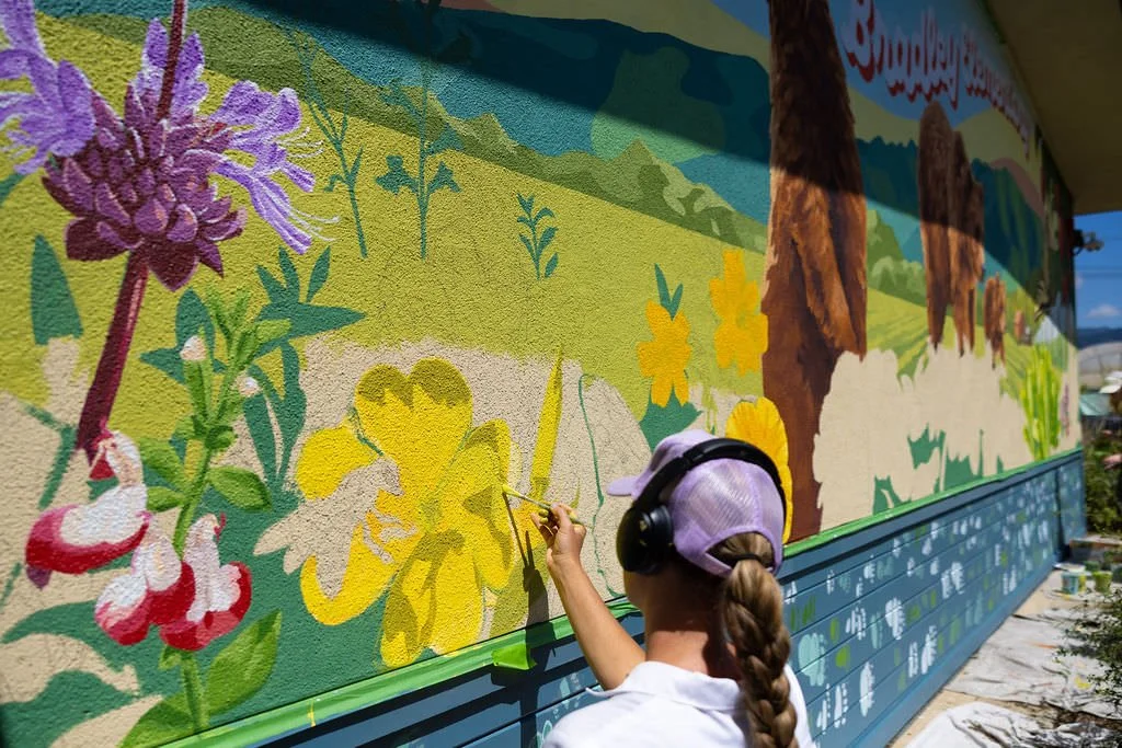 Brittany Costanzo painting the Bradley Elementary School Mural in Santa Cruz, CA 2026