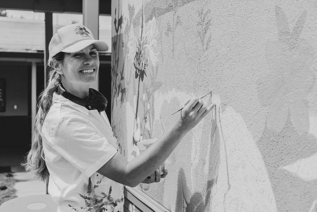 Aptos, California local muralist, Brittany Costanzo, hand painting the Bradley Elementary School Mural in 2026