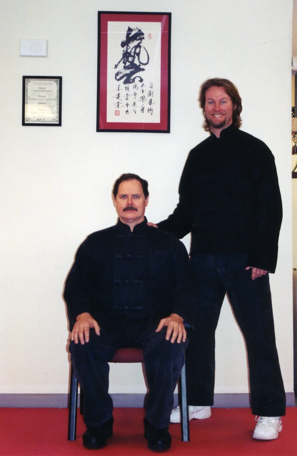 Dr. John Painter of 9 Dragon Bagua, and Sifu Kelly pose in a traditional picture.
