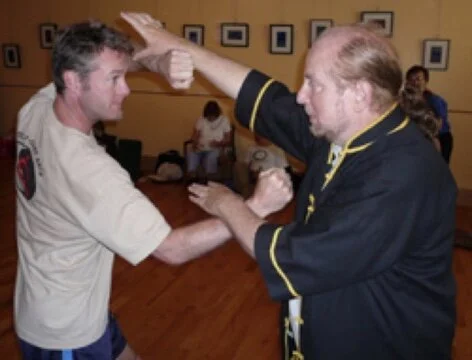 Kenneth S. Cohen (Gao Han) and Sifu Kelly Practicing Xing Yi two person set.