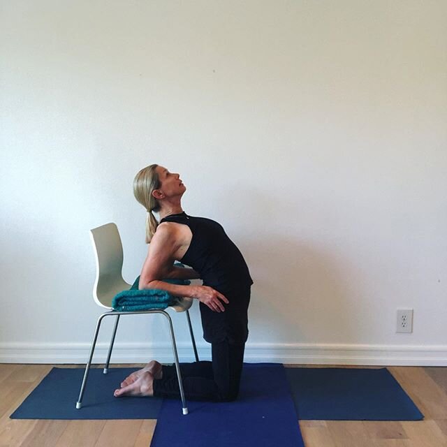 Ustrasana, camel pose is strengthening for the spine. Using a chair is a nice way to help maintain good alignment especially if you are just getting started. Bringing your elbows to the seat of the chair can seem like a long way down, notice I am usi