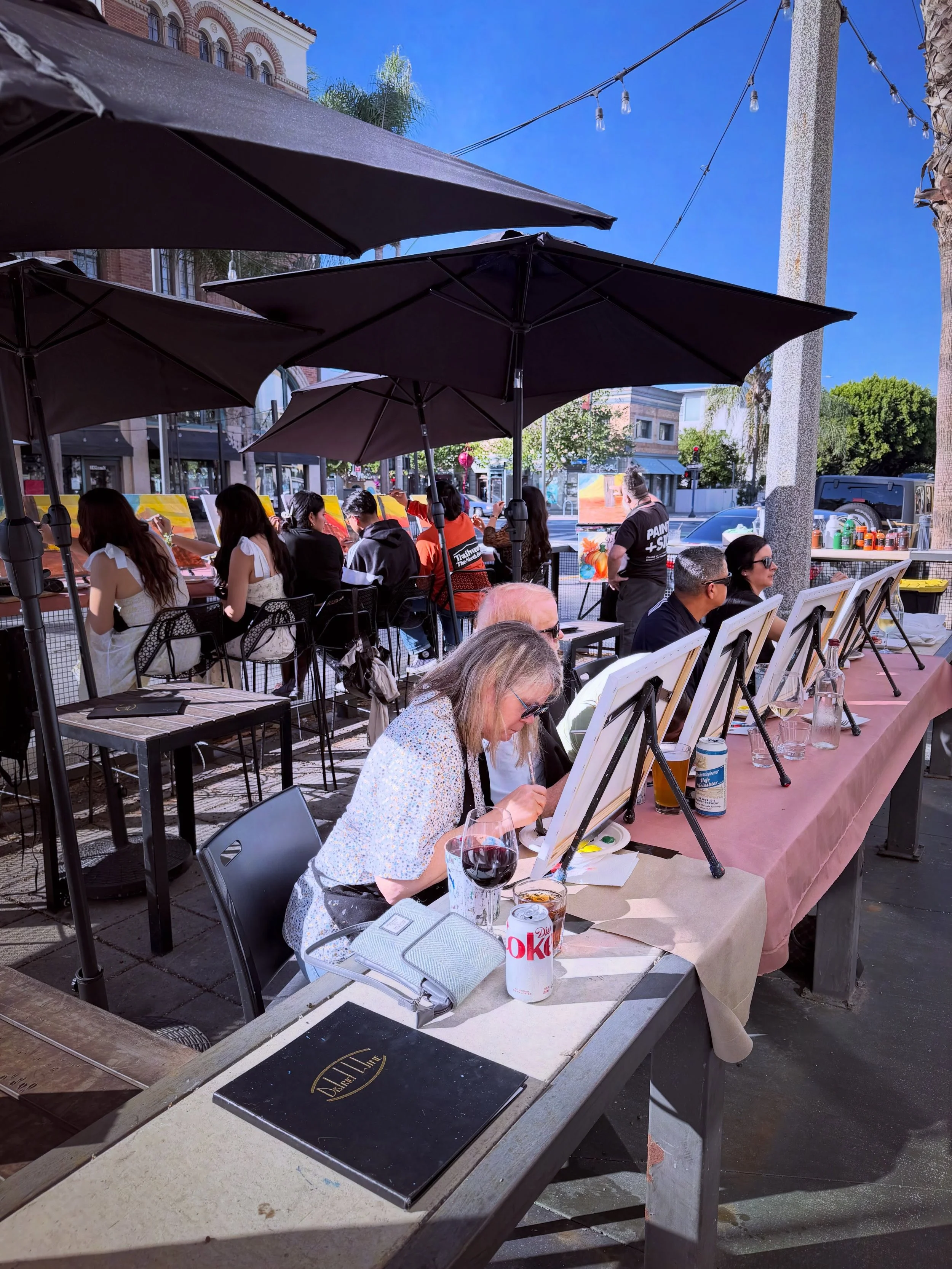 A beautiful, sunny Sunday afternoon at @districtwine painting pumpkins! #artandwine #artandcocktails #paintandsip #paintnight #longbeach @dtlballiance