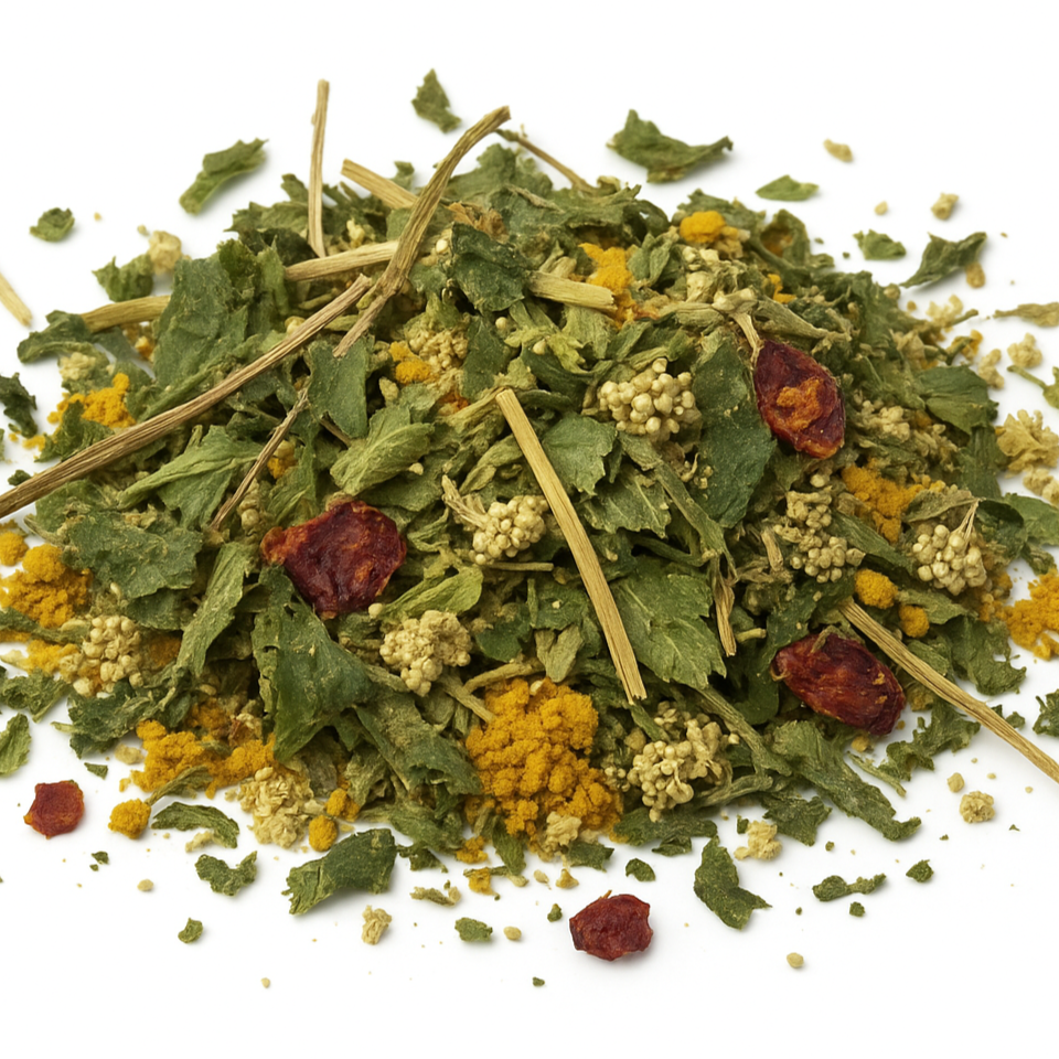 A vibrant herbal tea blend featuring nettle, goldenrod, turmeric, licorice root, peppermint, elderflower, rose hips, yerba santa, and yarrow on a white background. StrangeMakes.Com