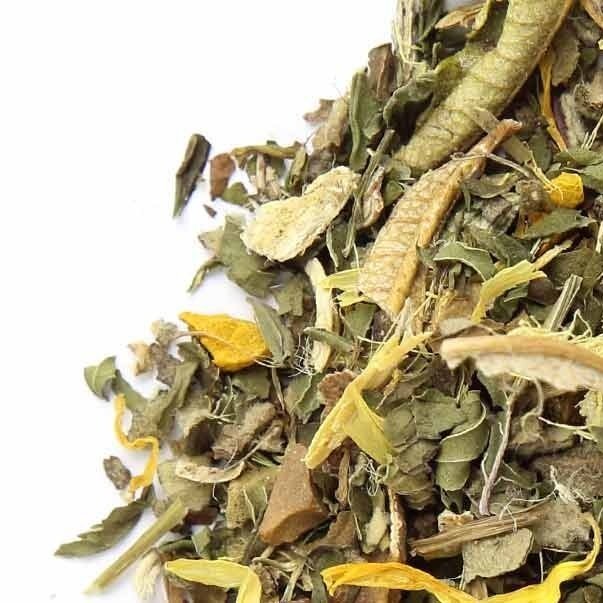 Close Up Strange Makes Deep Breath loose leaf tea on a white surface, an herbal blend designed to support respiratory health, relaxation, and overall wellness.
