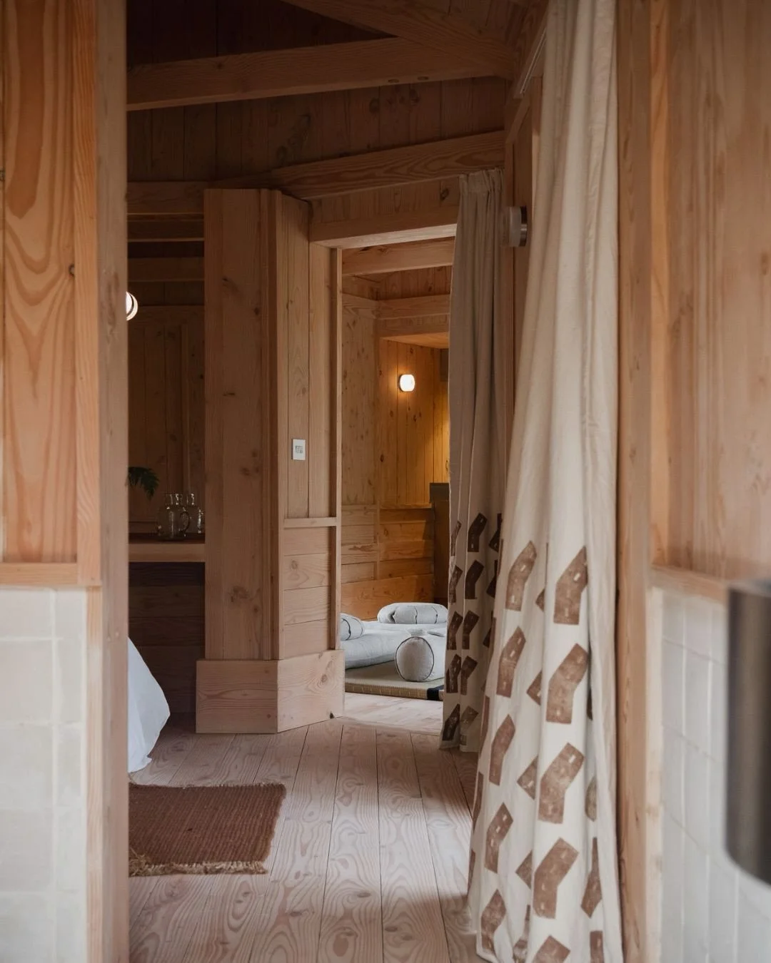Inside Yogi&rsquo;s Cabin, the bathroom follows the same material palette and architectural detailing carried throughout the rest of the cabin.

Douglas fir timber lines the surrounding interiors, while handmade ceramic tiles and stainless steel fini