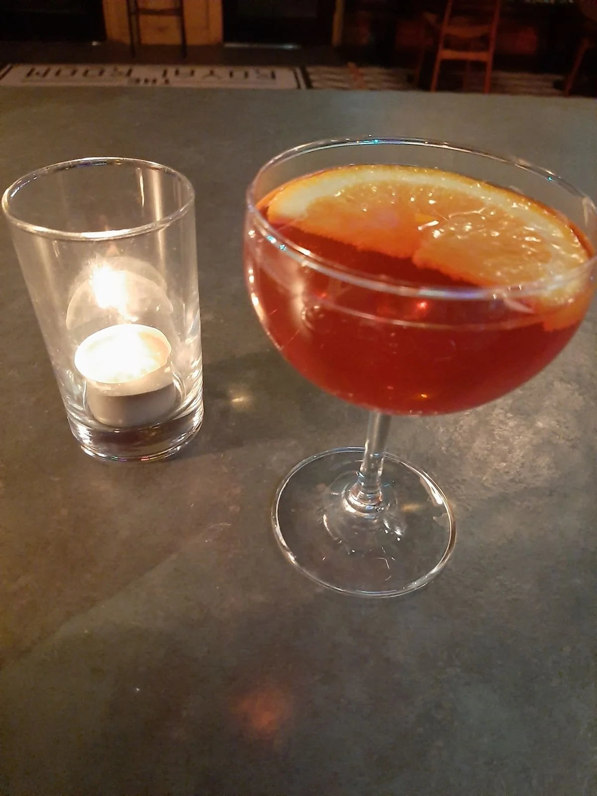 Candlelit cocktail on the bar at The Royal Room in Tucson