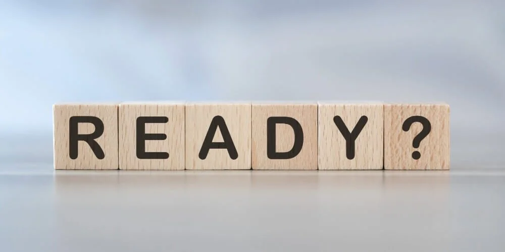 wooden blocks with letters spelling out "READY?"