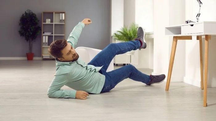 man falling on the ground at home