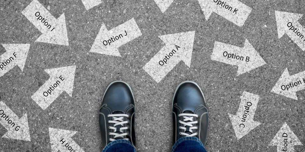 person standing with arrows pointing various ways with different options
