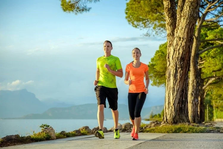 man and woman walking quickly