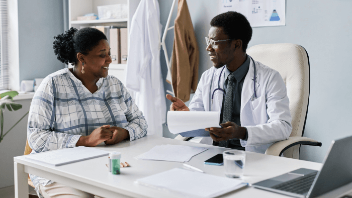 woman talking to her doctor