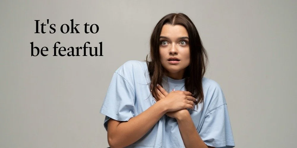 fearful women with the words "It's ok to be fearful"