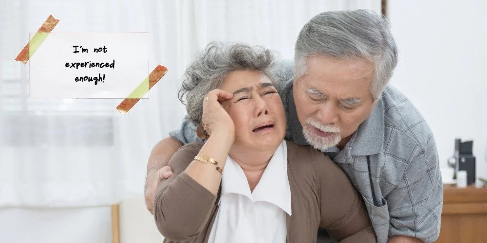woman being consoled by her husband due to her fear