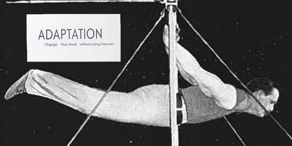 George Eyser performing on bars with the word "Adaptation" above