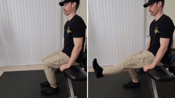 brent seated and kicking one leg out