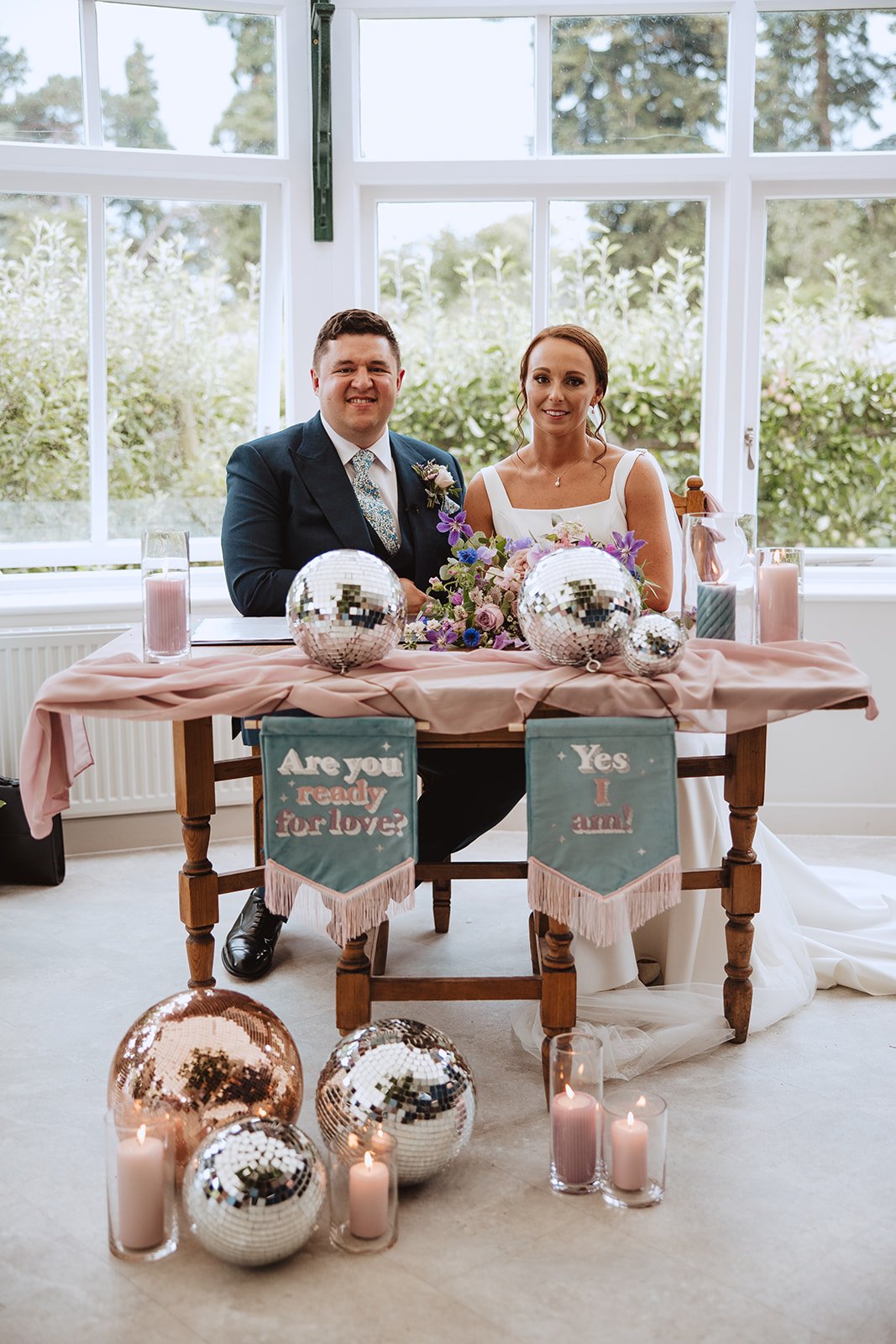 Mirrorballs and bespoke banners at Comberemere Abbey wedding in Cheshire