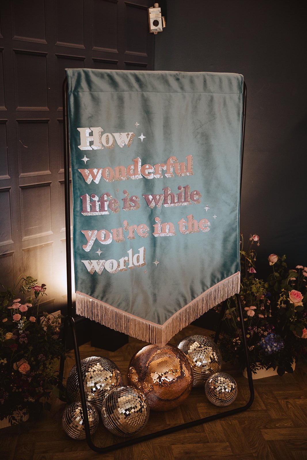 Fun and personalised wedding backdrop at Combermere Abbey in Cheshire