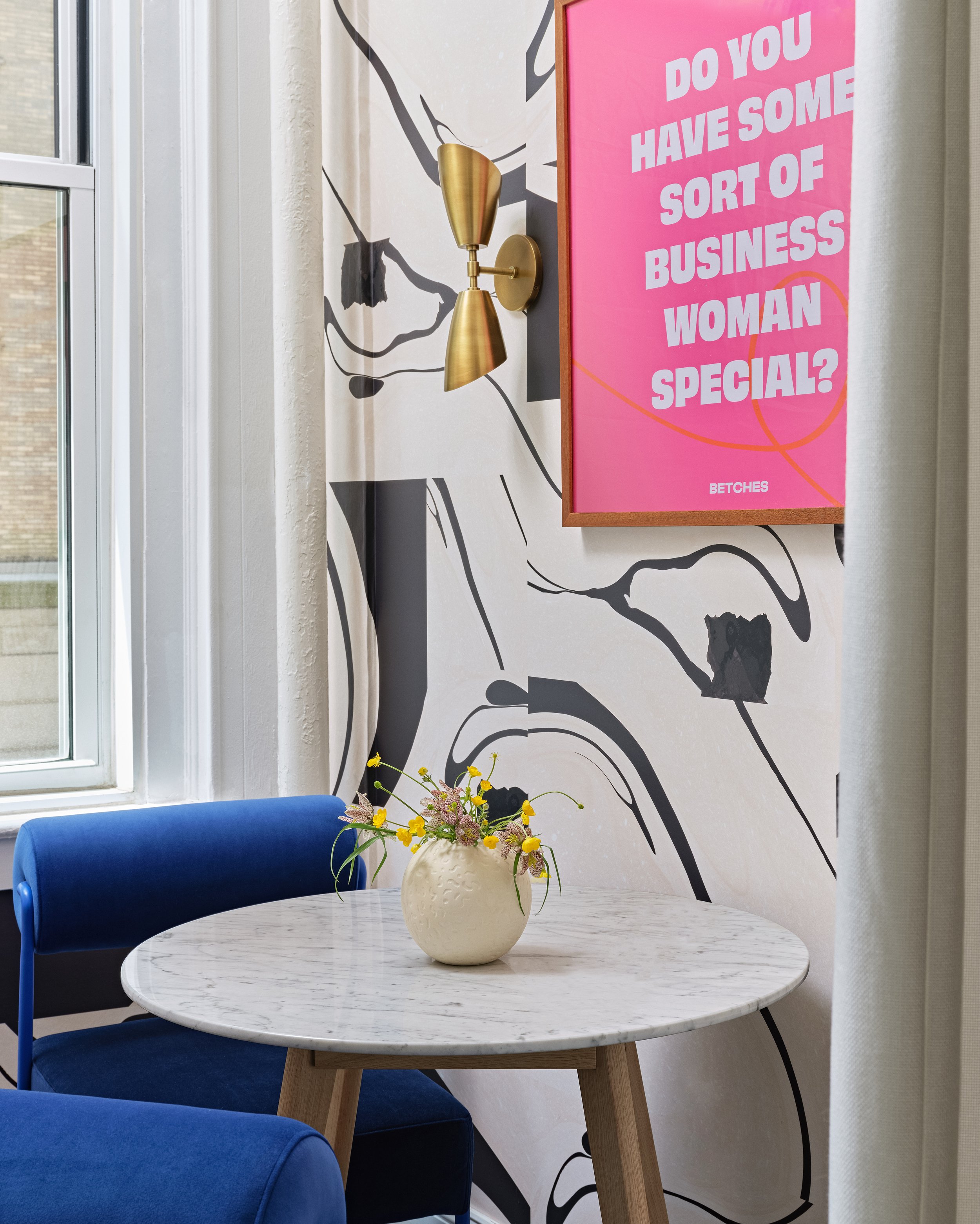 Betches office small conference room with custom art designed by Molly Torres Portnof of DATE Interiors Long Beach New York designer
