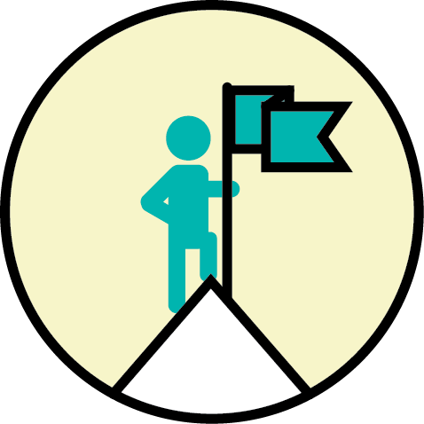 Person standing on mountain top with flag