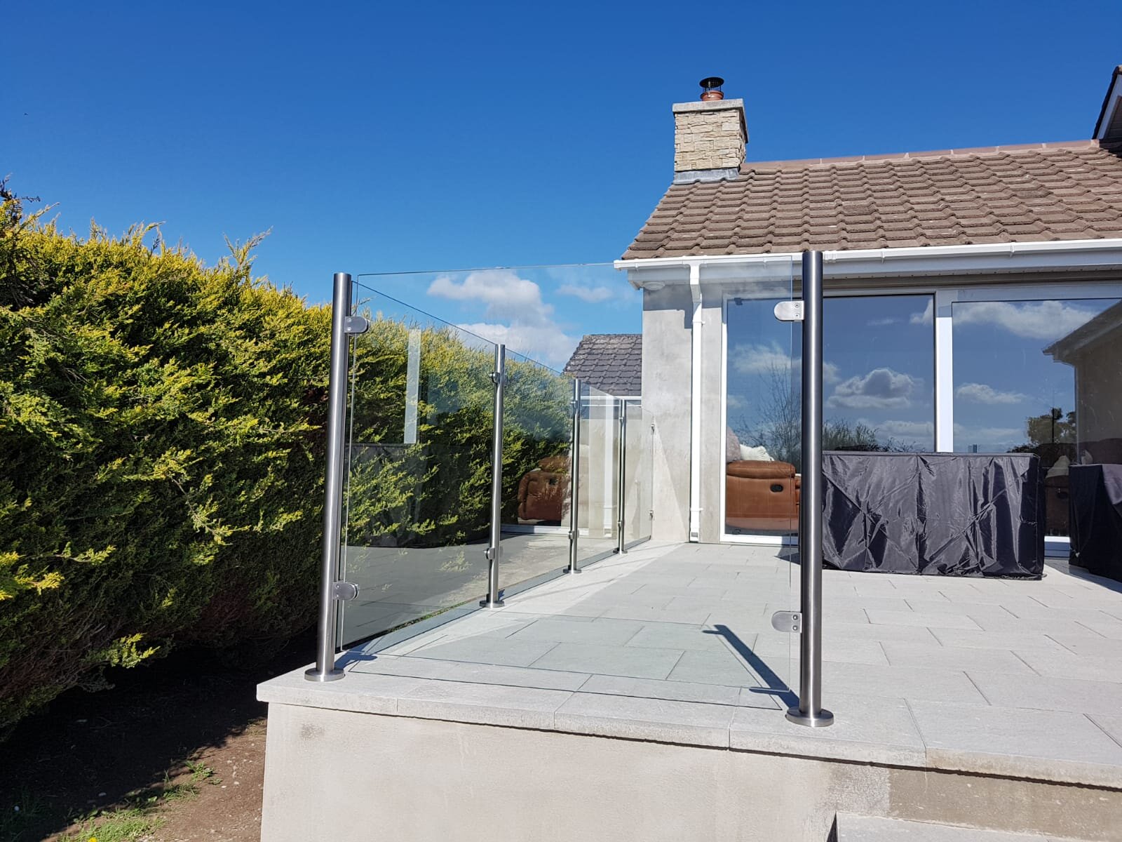 Glass balustrade with stainless posts.