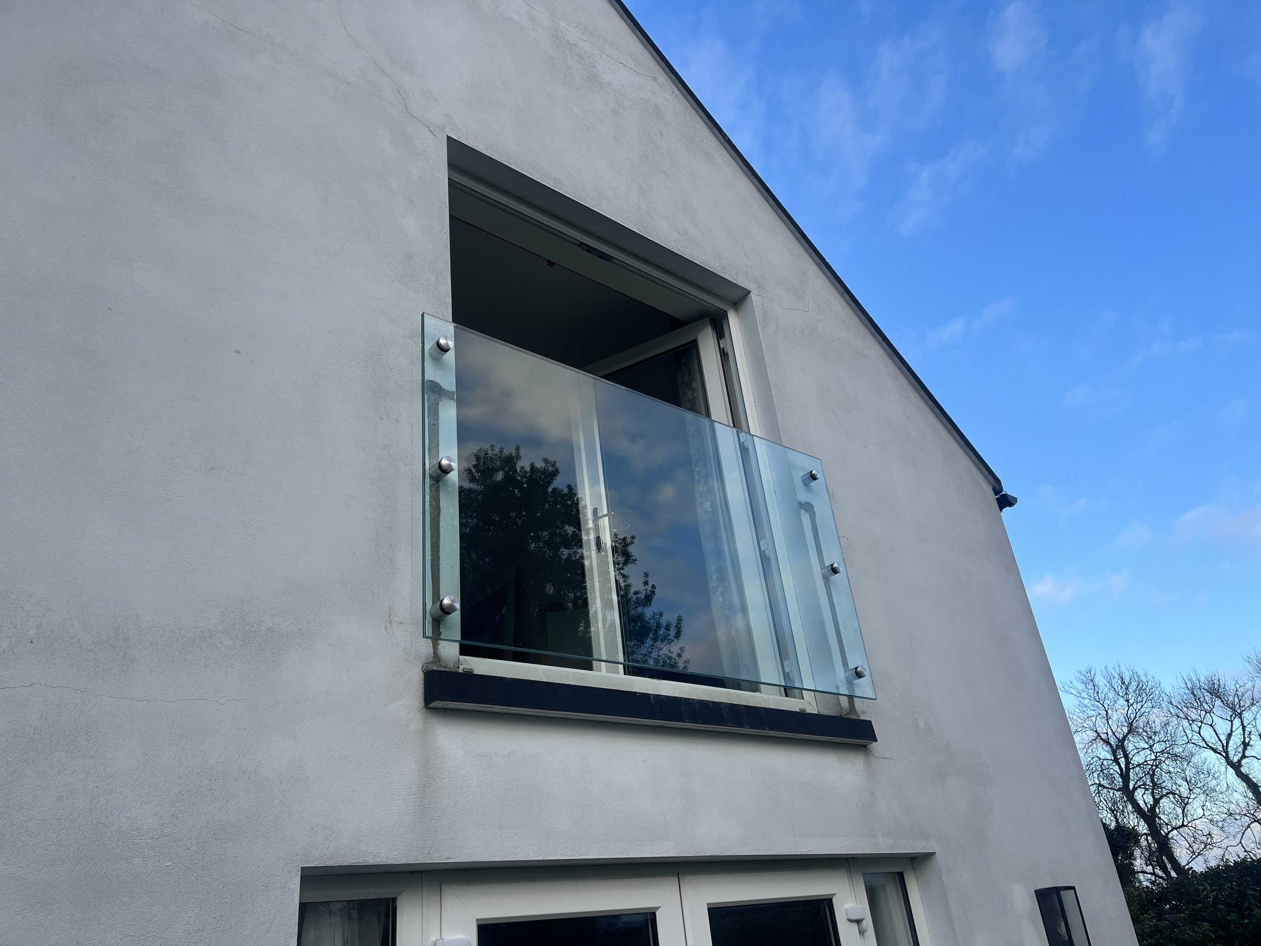 Frameless glass balconies Northern Ireland Uninterrupted Views and Modern Style