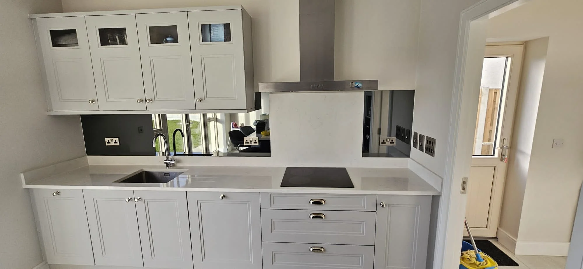Why Your Kitchen Needs a Mirror Splashback by stile glass Northern Ireland