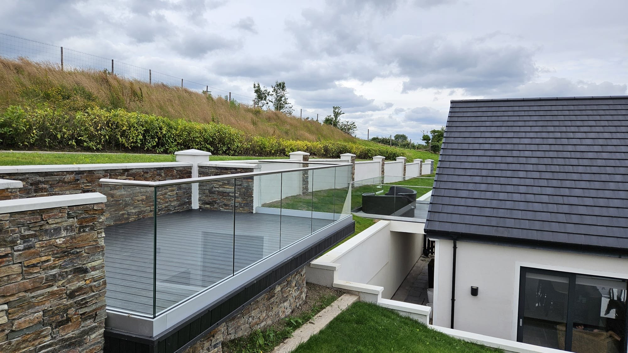 Elevate Your Outdoor Space with Glass Balustrades on Composite Decking - Stile Glass, Northern Ireland