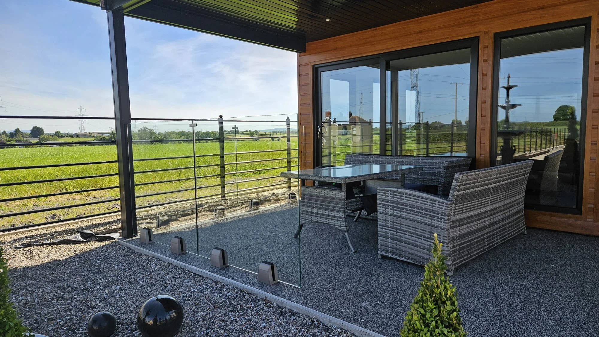 Beat the Summer Breeze with Style: Frameless Glass Balustrades with Windbreaks by Stile Glass, Northern Ireland