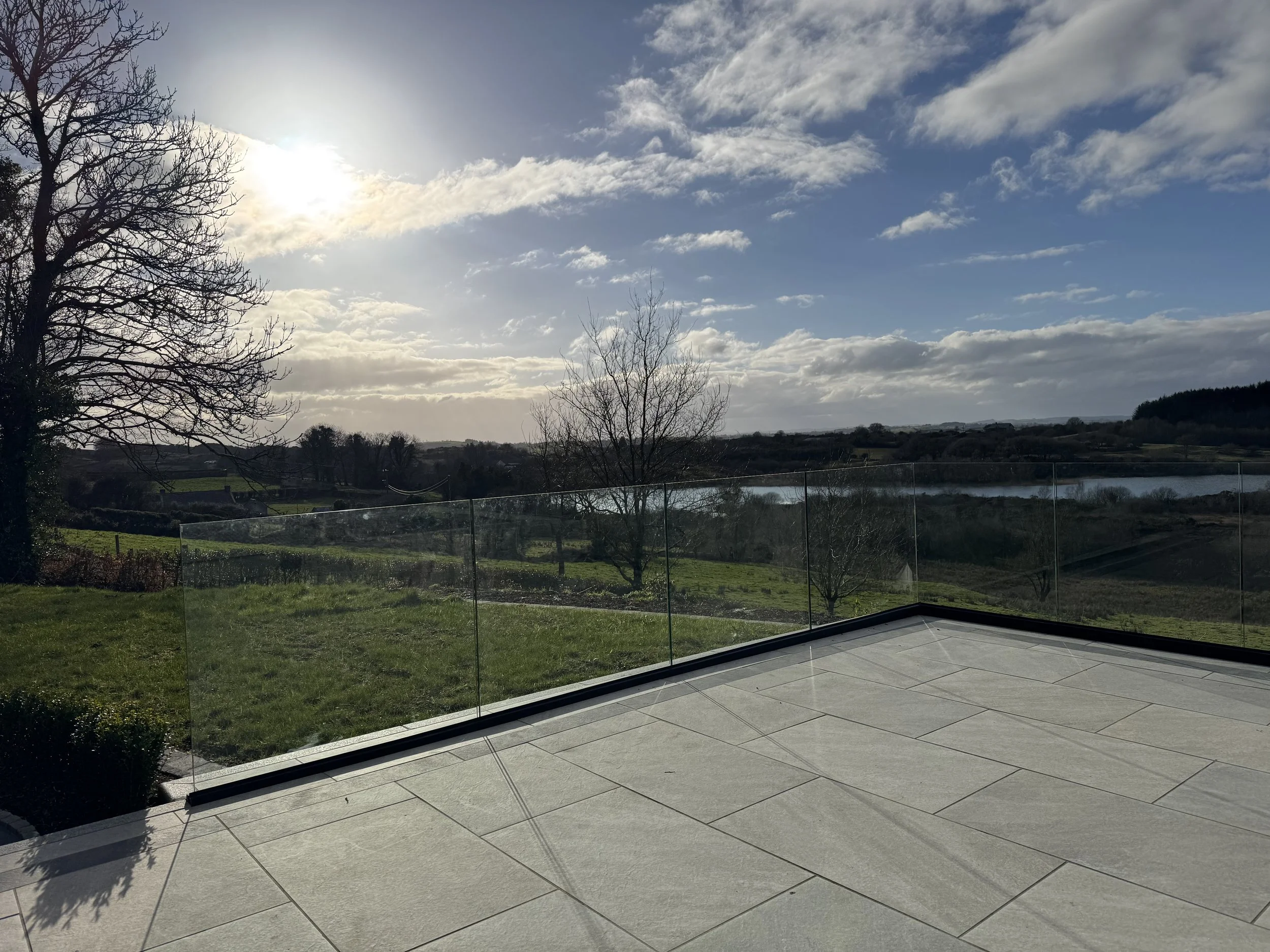 How can Glass Balustrades enhance views?