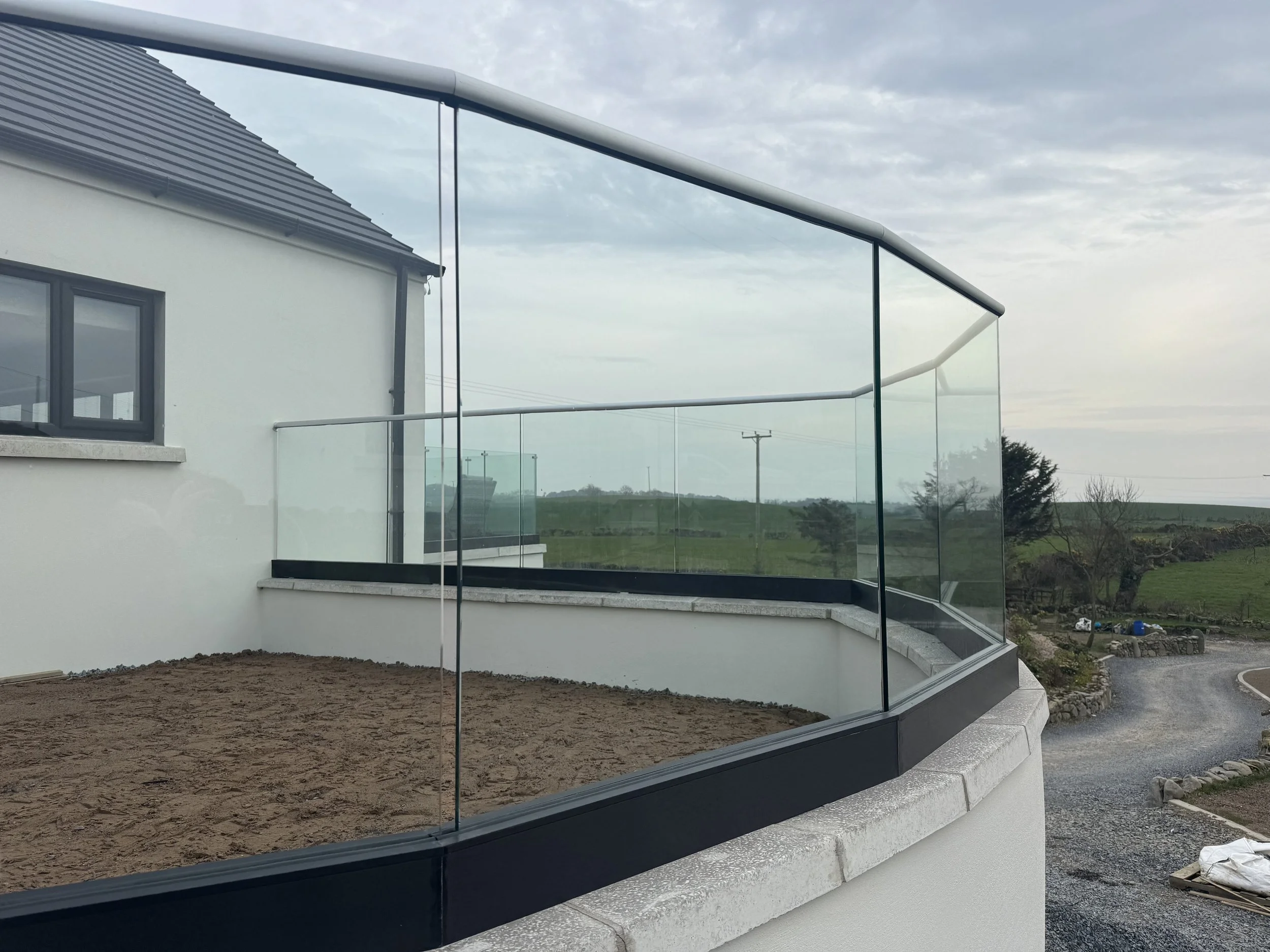 LET'S TALK ABOUT THE SHEER ELEGANCE OF GLASS BALUSTRADES