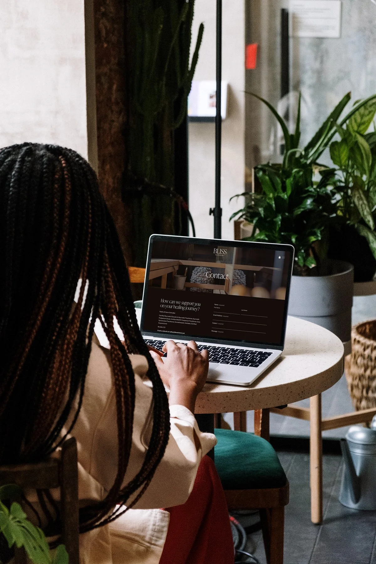 mockuuups-macbook-pro-mockup-on-white-table-with-notebook-by-the-side.jpeg