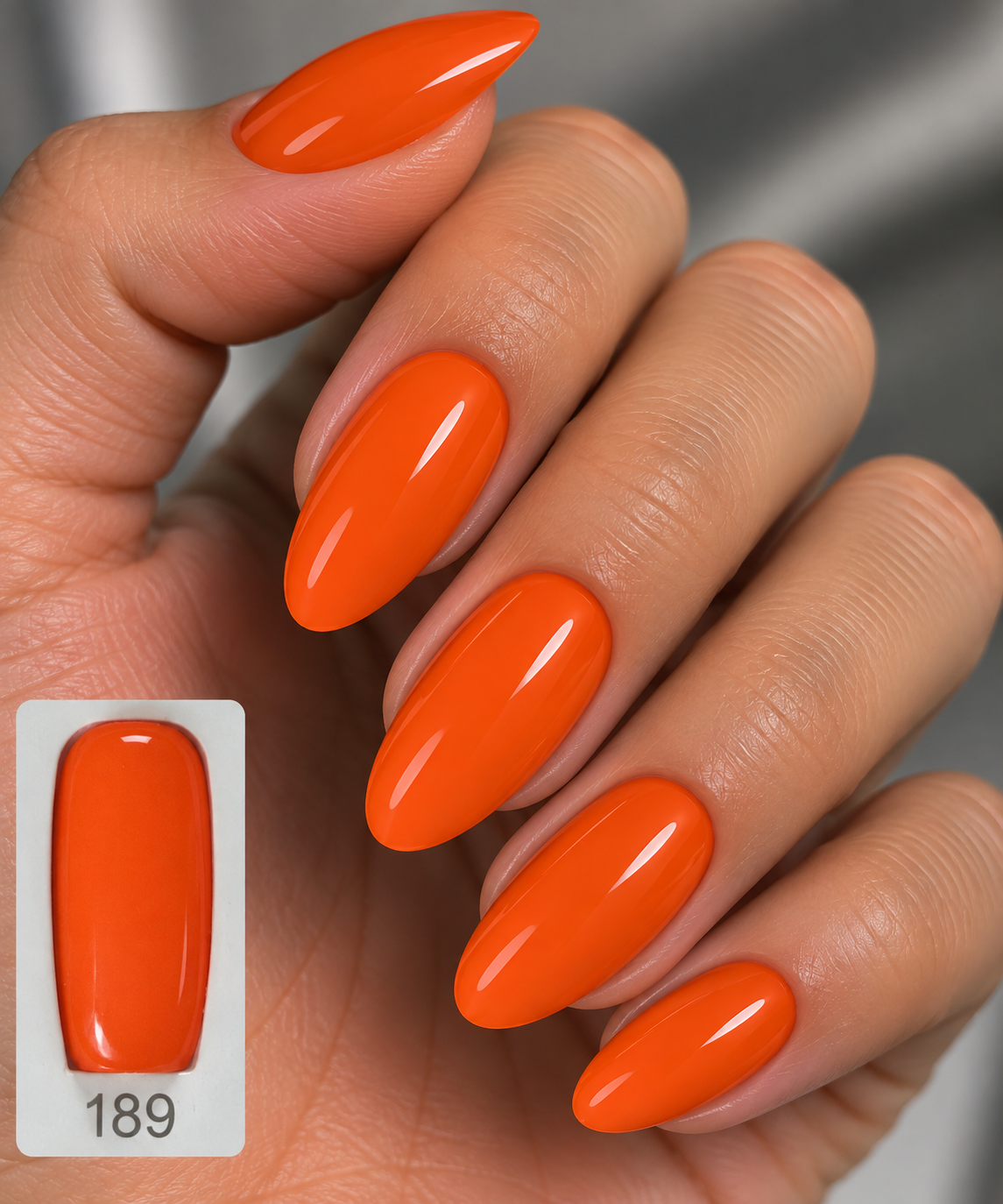 Astonishing Gel Polish #189 Ferris Glow neon bright gel nail polish bottle with glowing vibrant orange color on nails