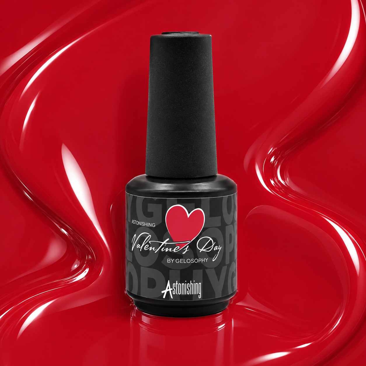 Astonishing Gelosophy Valentine’s Day red gel polish bottle on a glossy red gel background.